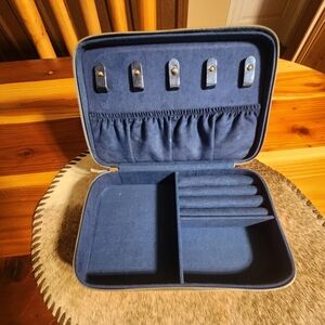 Jewelry Box, 5" x 8" x3". Two zip compartments